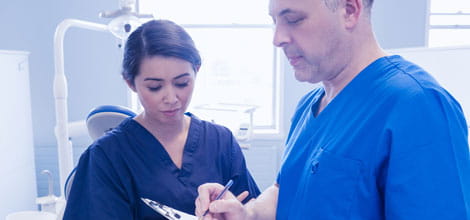 Dentists working together.